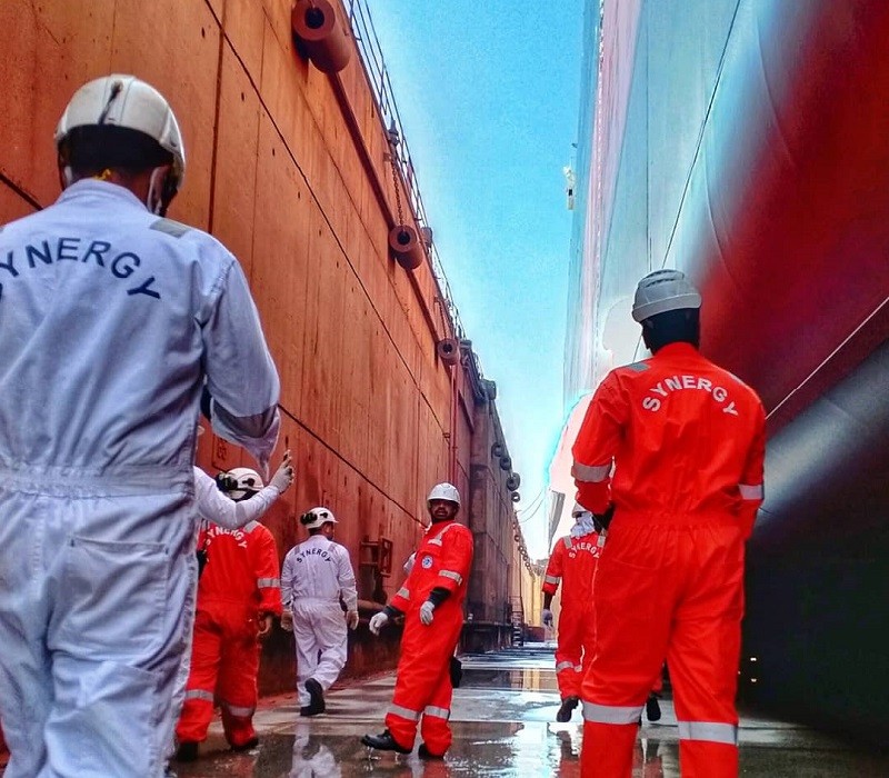 Synergy Maritime crew in dry dock