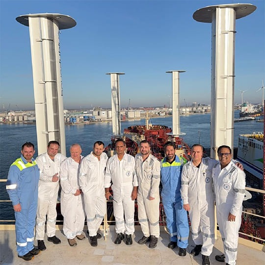 Crew and project team onboard Maersk Trieste in Antwerp following installation of four eSAIL suction sails