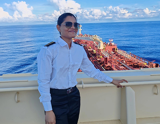 Engine Cadet Jaishni Jayakumar on deck overlooking the sea